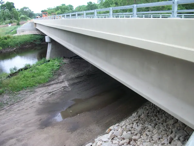 Coated bridge girders over the river
