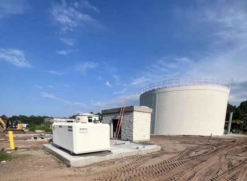 Ground storage tank, standby generator and pump building
